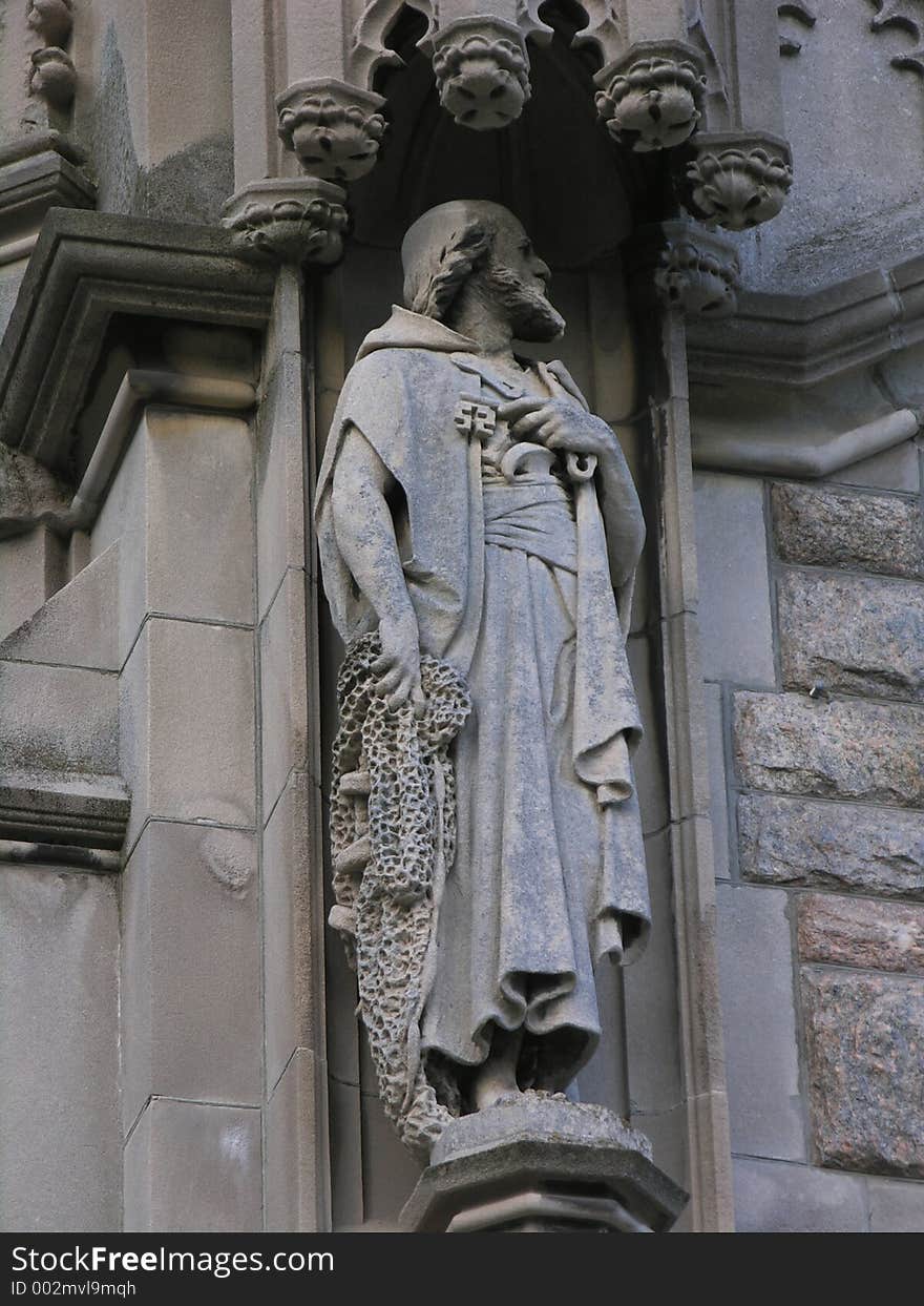 Carved figure on historic church.