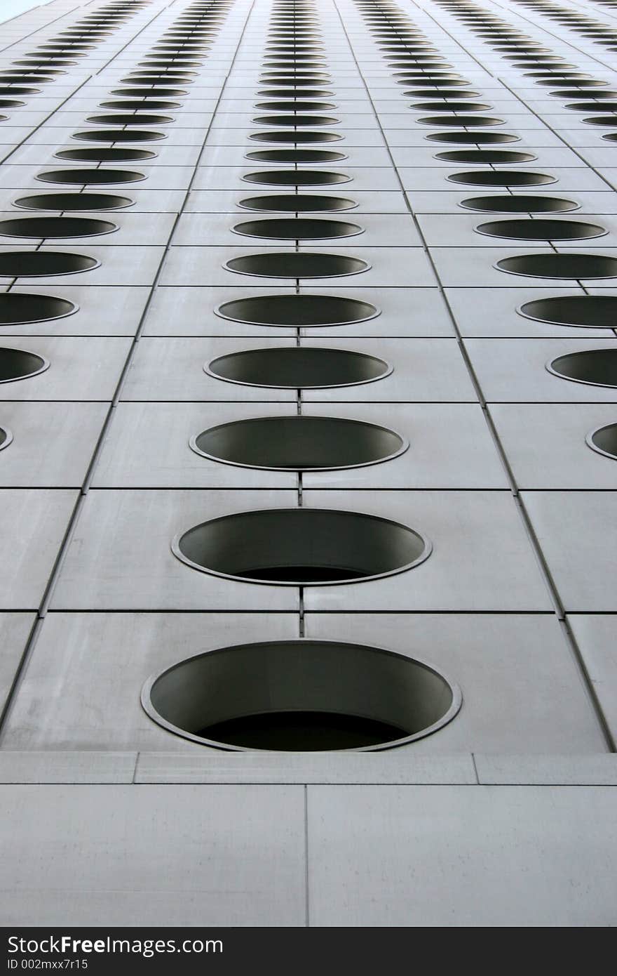 Taken from an interesting viewpoint - this is a pattern of circular windows of a skyscraper/office tower in Central, Hong Kong. Taken from an interesting viewpoint - this is a pattern of circular windows of a skyscraper/office tower in Central, Hong Kong.