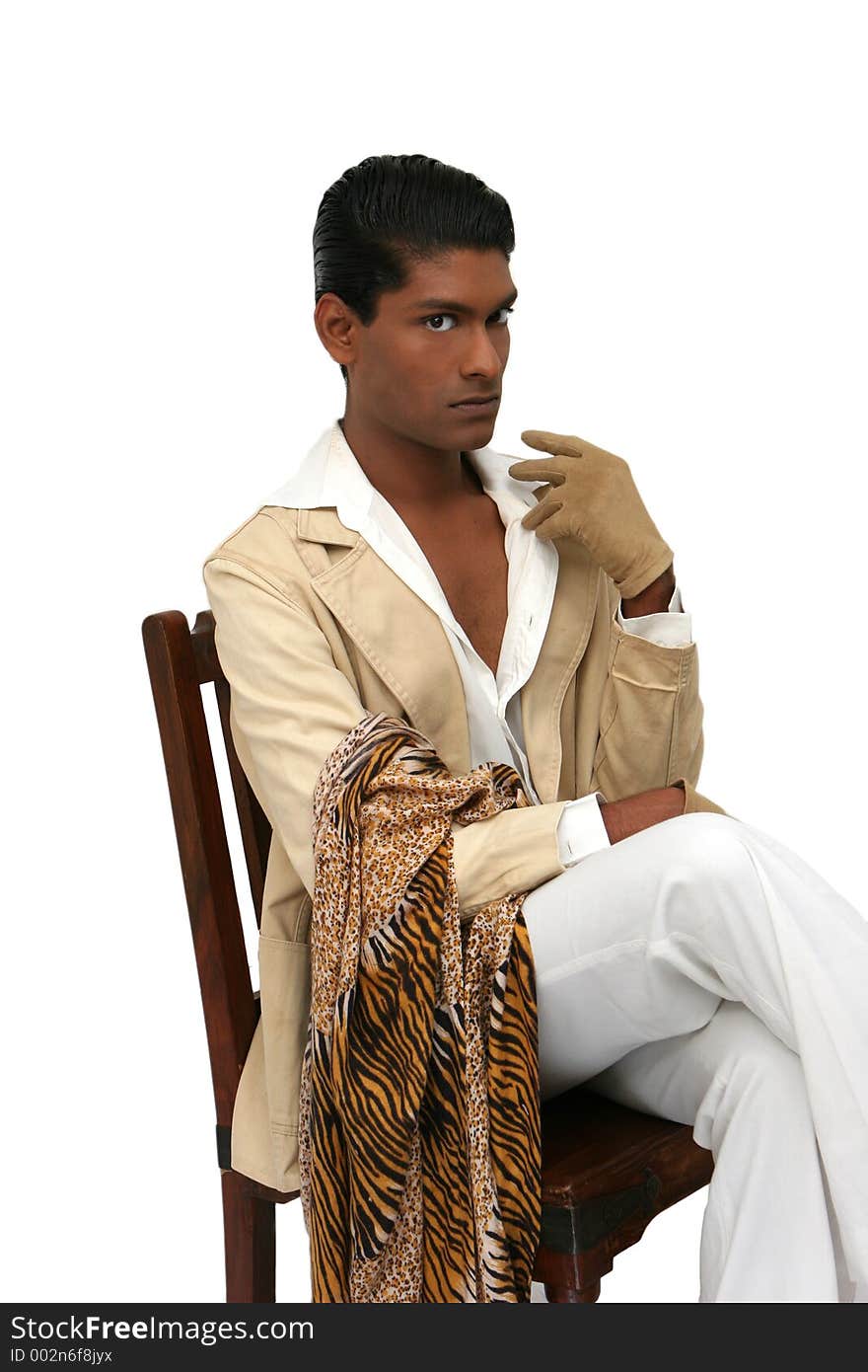 Handsome young exotic man, in cream suit. Handsome young exotic man, in cream suit