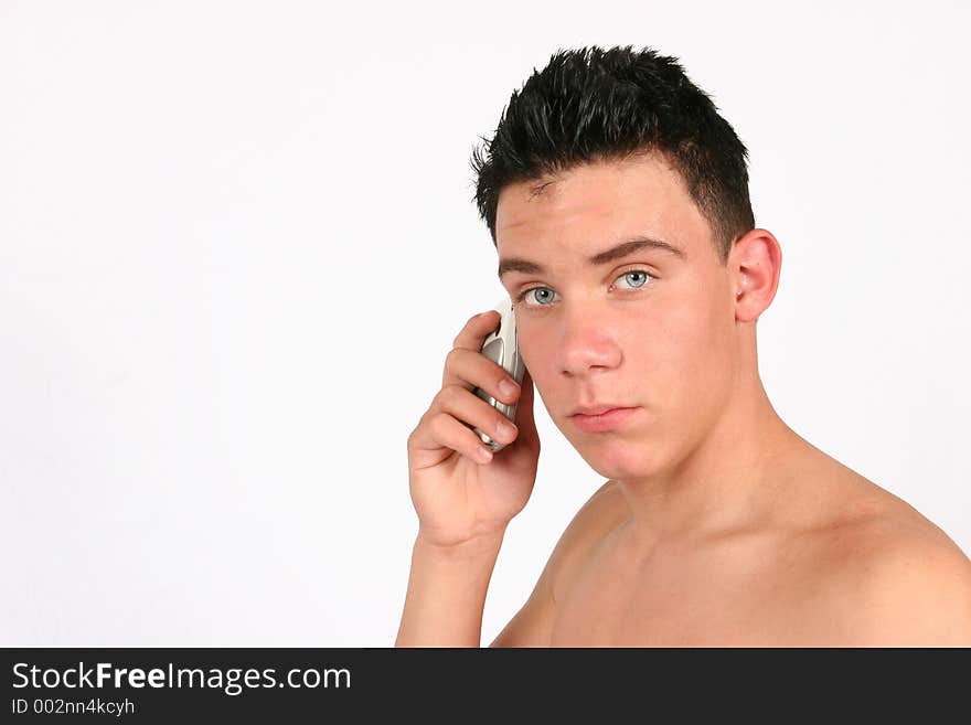 A portrait of a Topless male on his phone