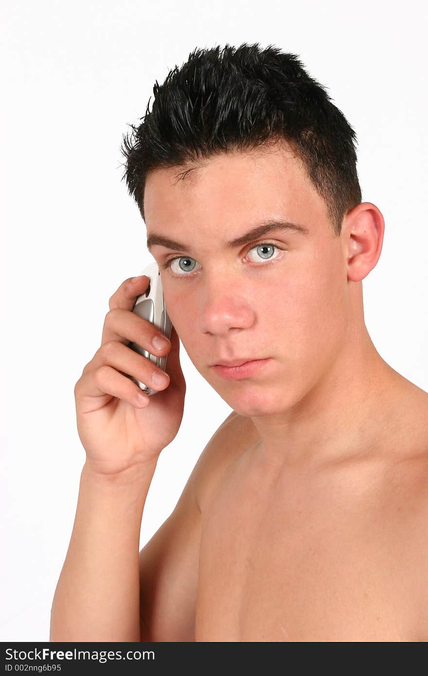 A portrait of a Topless male on his phone