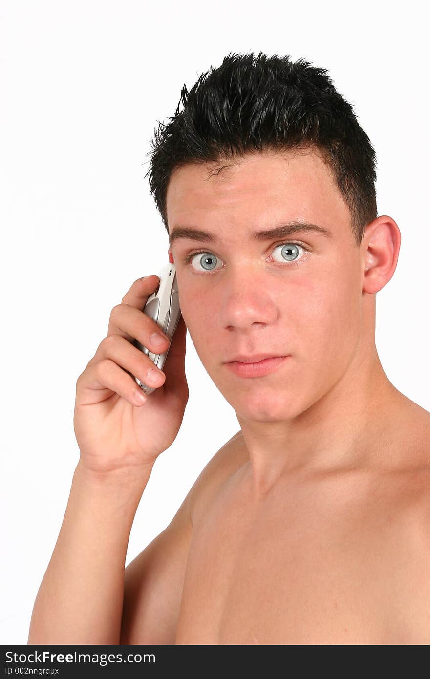 A portrait of a Topless male on his phone