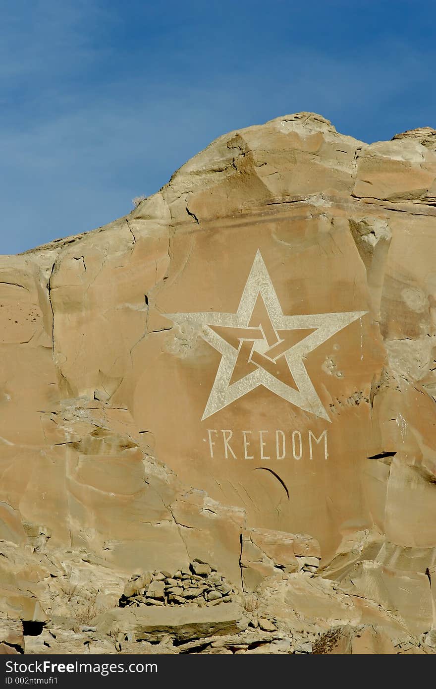 Freedom carved into stone with giant star, in the middle of nowhere, wyoming.