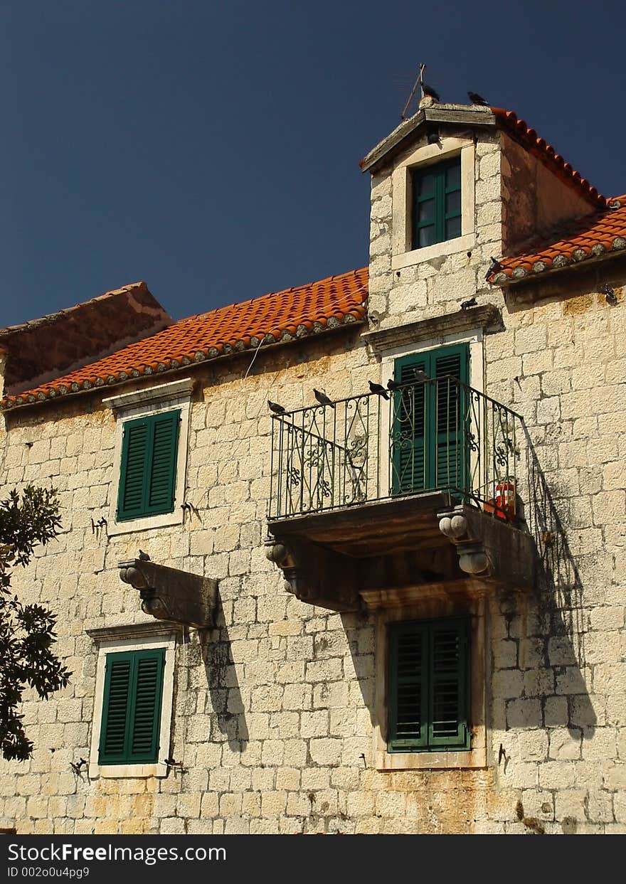 Home With Green Shutters