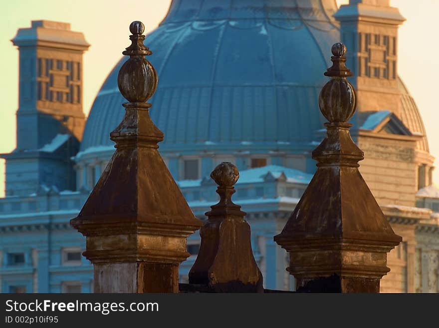 Some roof top decorations set against a domed roof in old Montreal. Some roof top decorations set against a domed roof in old Montreal