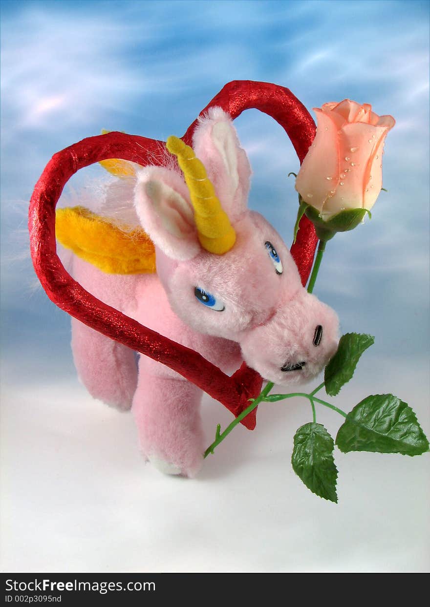 Pink unicorn with red heart and rose. Pink unicorn with red heart and rose.