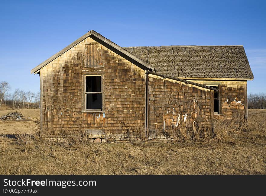 An abandoned farmhouse. An abandoned farmhouse