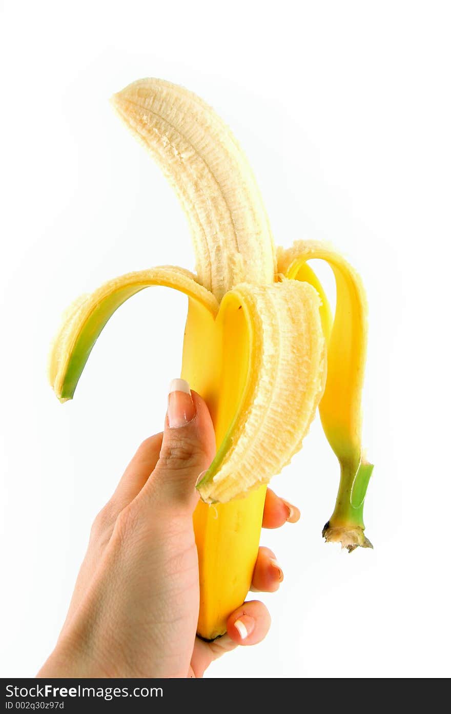 Peeled Banan in Hand on White. Peeled Banan in Hand on White