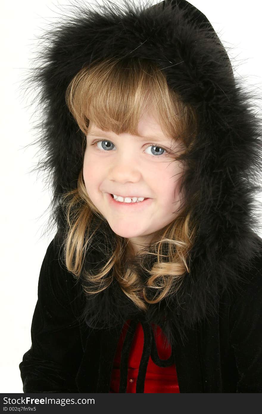 Beautiful Four Year Old Girl In Feather Hooded Sweater