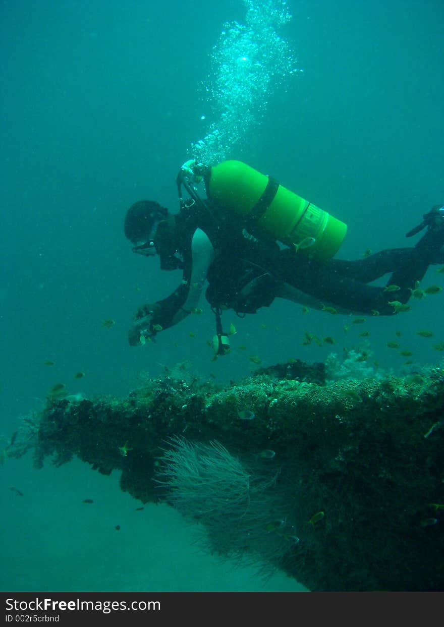 Diver Over A Wreck