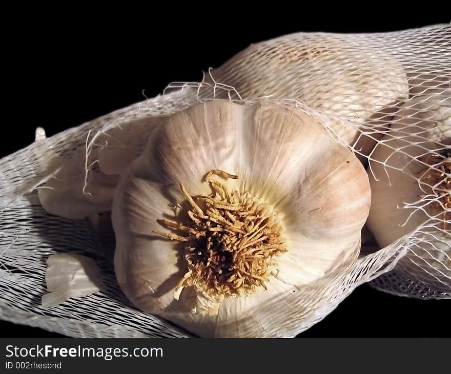 Cloves of Garlic in sack