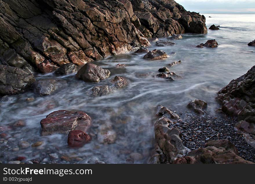 Slow shutter speed shot of a pebbly beach. Slow shutter speed shot of a pebbly beach