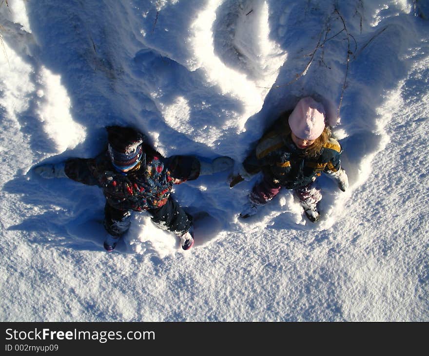 Two little friends, sliding down to the bottom of the steep hill. Two little friends, sliding down to the bottom of the steep hill.