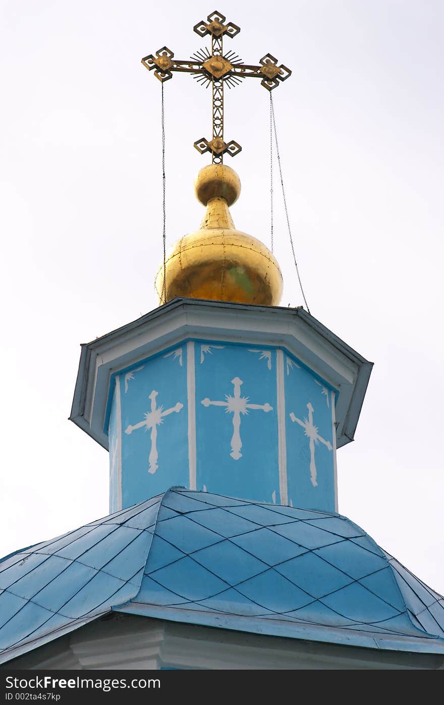 Ortodoxy cross by belltower of church