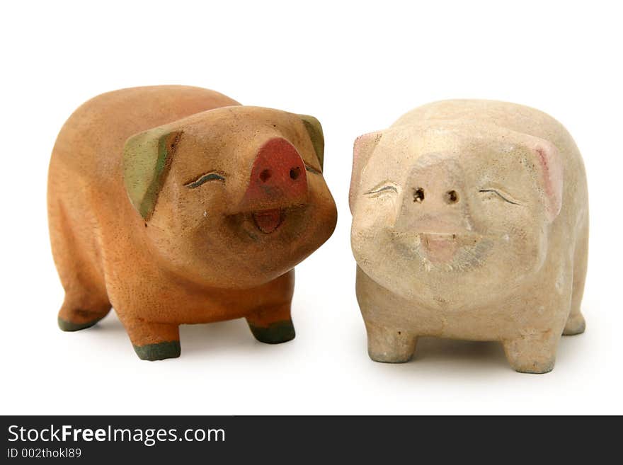 Cheerful and decorative piggy wood carvings for interiors or as gifts. Cheerful and decorative piggy wood carvings for interiors or as gifts