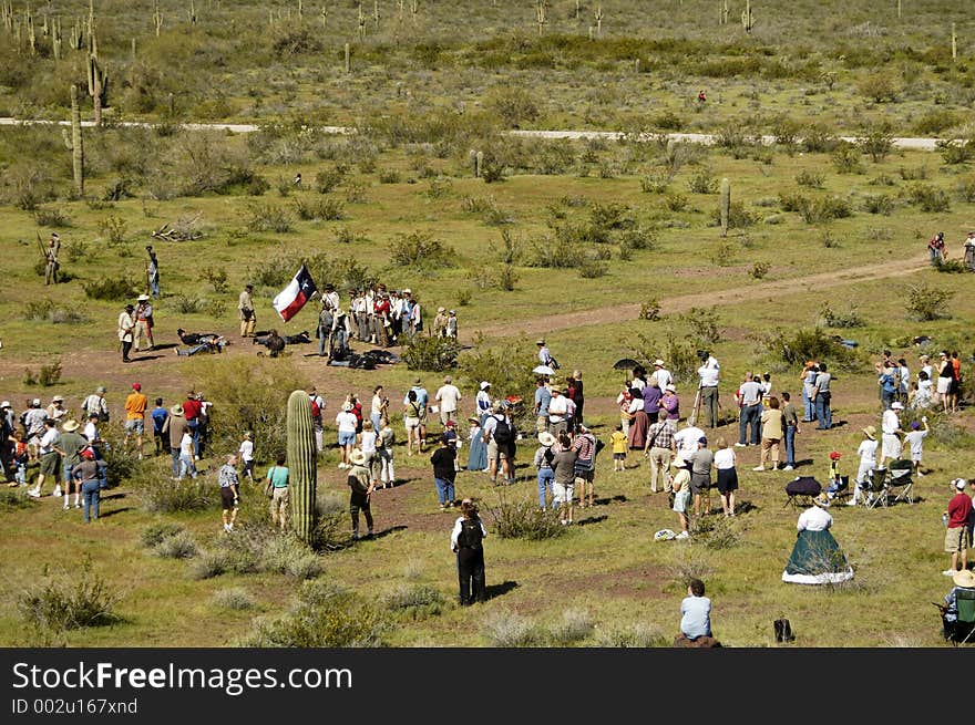 Spectators and participants in a civil war battle enactment. Spectators and participants in a civil war battle enactment.