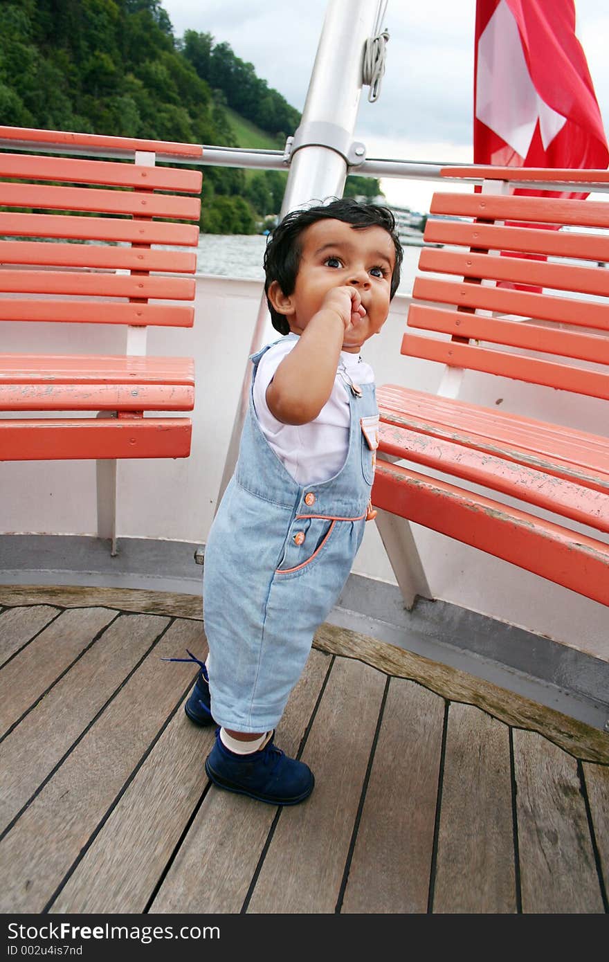 KidStanding In Boat