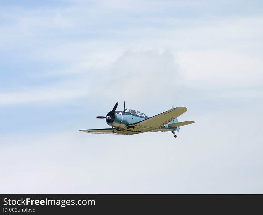 Dive Bomber Flying in the clouds. Dive Bomber Flying in the clouds