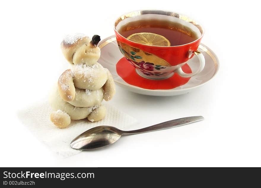 Snowman with cap of tea