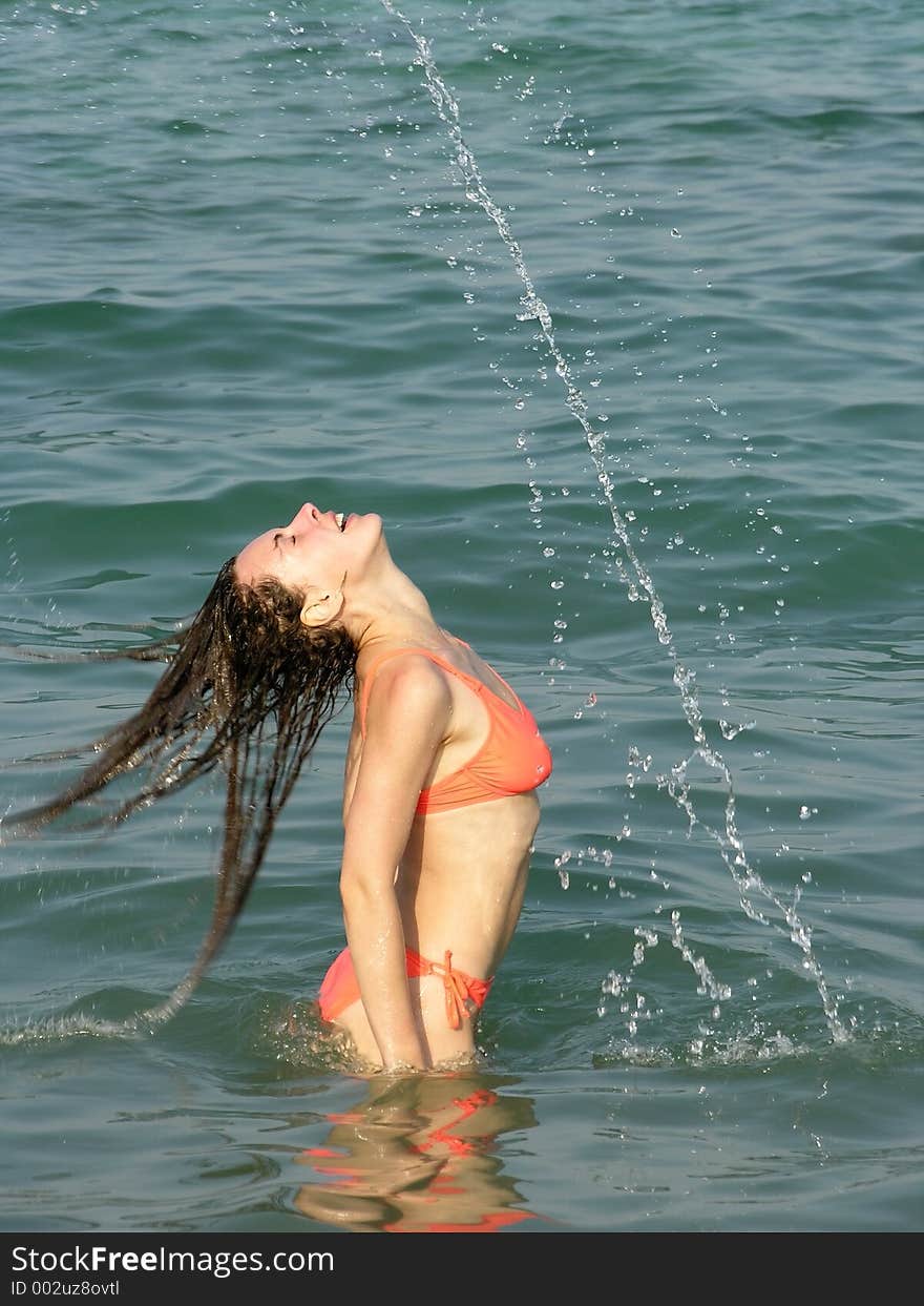 Girl with drops from hair