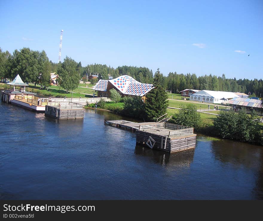 New village was created for nature rest and care of culture traditions, view from ship (St.Petersburg regio). New village was created for nature rest and care of culture traditions, view from ship (St.Petersburg regio)