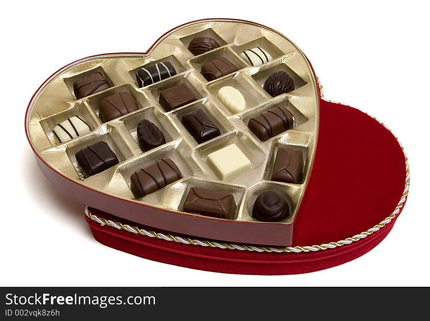 Open heartshaped box full of candy. Red Velvet, which clipping path. Open heartshaped box full of candy. Red Velvet, which clipping path.