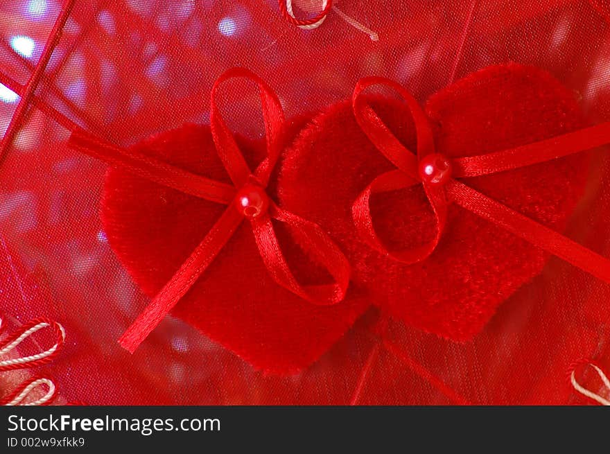 Top of a mesh valentines day box fuzzy hearts red beads and red bows