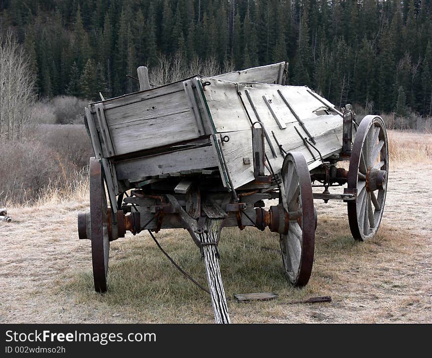 This old wagon has seen better days however is still intact where it sits in the foothills of Alberta. This old wagon has seen better days however is still intact where it sits in the foothills of Alberta.