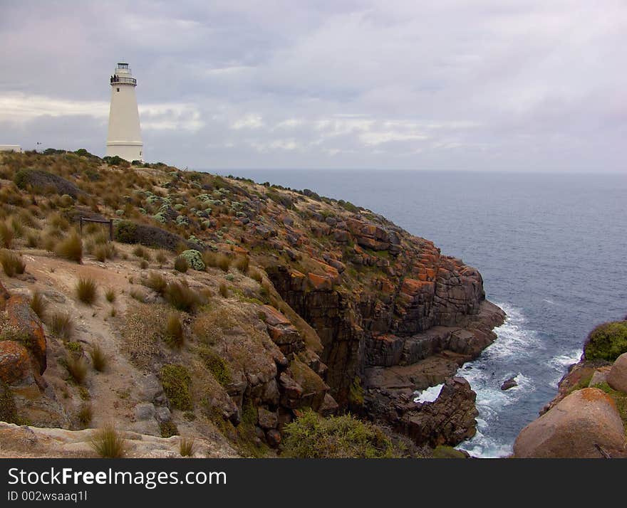 Lighthouse on rugged coast