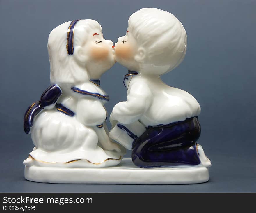 China figurine of boy and girl kissing each other. China figurine of boy and girl kissing each other