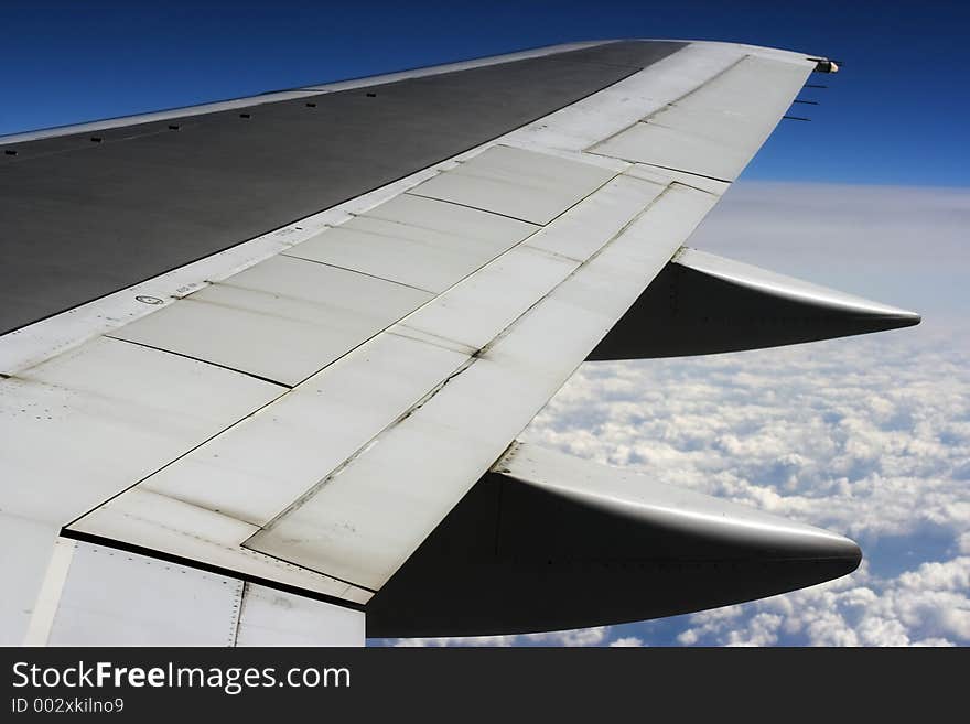 View out of cabin window on a plane. View out of cabin window on a plane