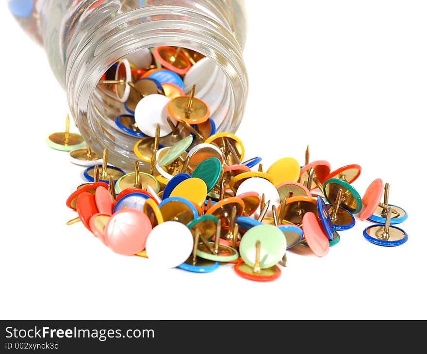 Spilled colorful push pins