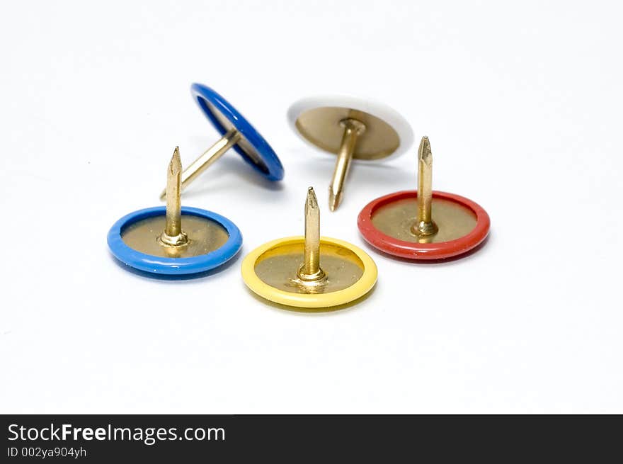 Colored thumbtacks 5 white background