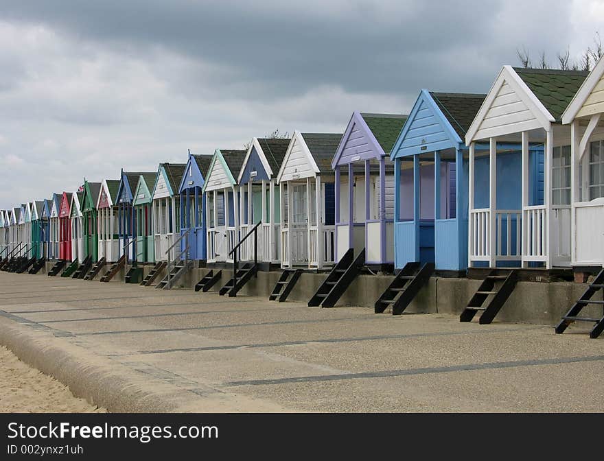 A row of English sea-side beach-huts. A row of English sea-side beach-huts