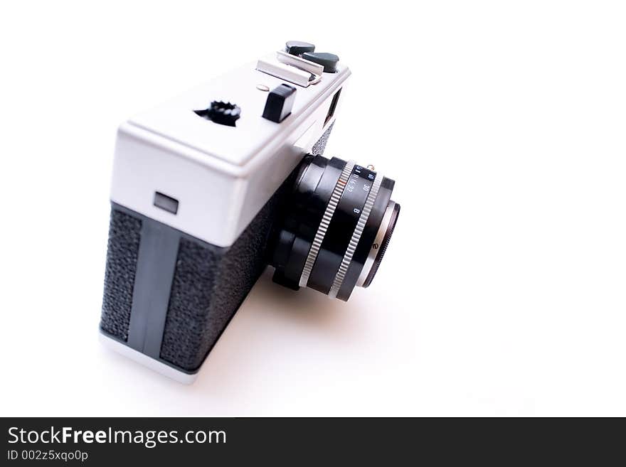 Vintage camera isolated on white background - shallow DOF. Vintage camera isolated on white background - shallow DOF