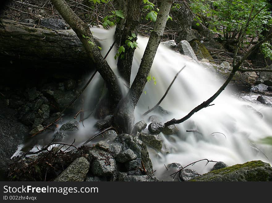 Overflowing stream in Yosemite National Park, California, U.S.A. Overflowing stream in Yosemite National Park, California, U.S.A.