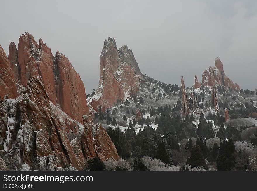 Snowy Landscape with Red Rock Formations