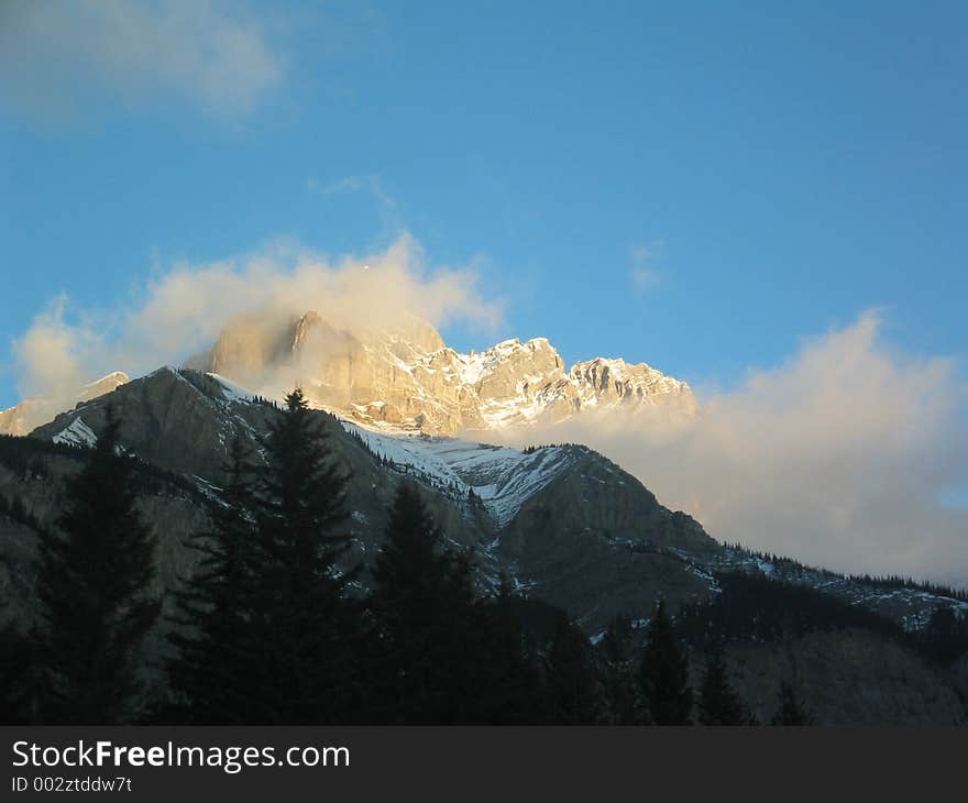 Shot of the sunlight on the a Canadian Rocky Mountain. Shot of the sunlight on the a Canadian Rocky Mountain.