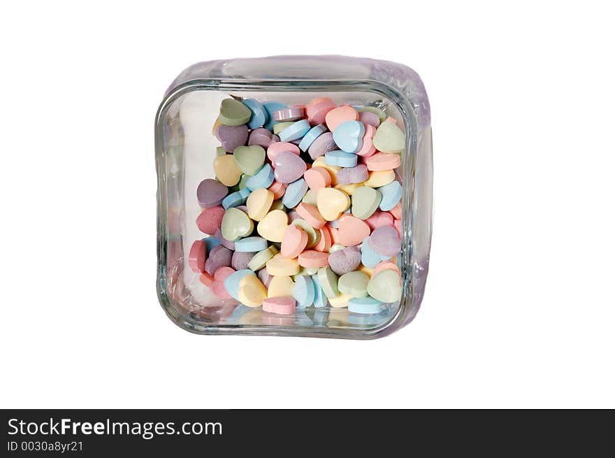 Heart shaped sweet tarts in a glass ar