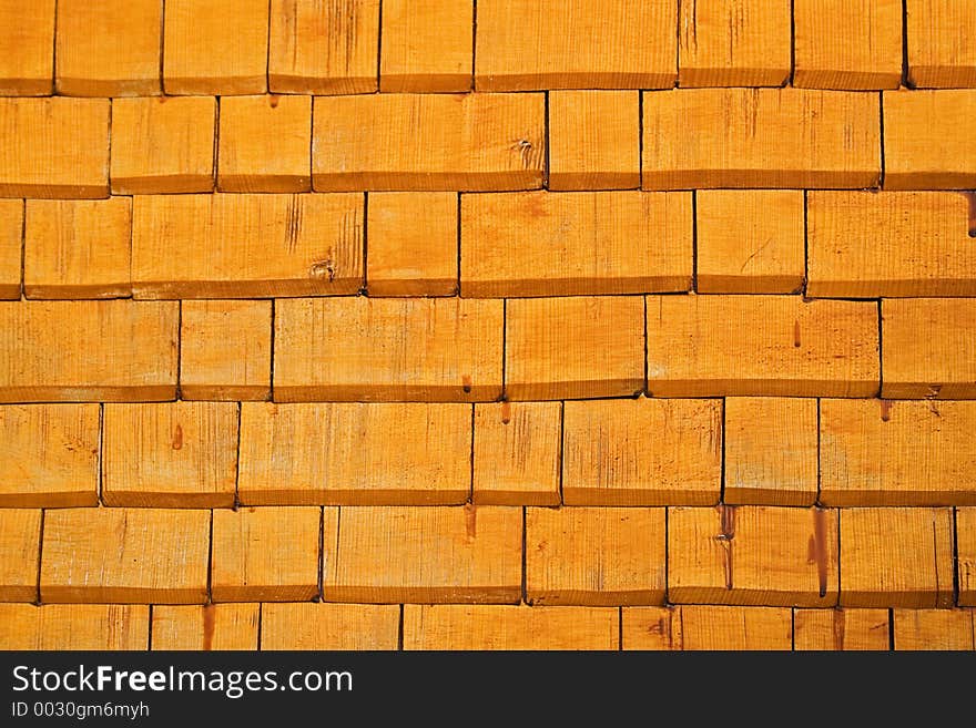 Texture shot of a weathered orange façade. Texture shot of a weathered orange façade.