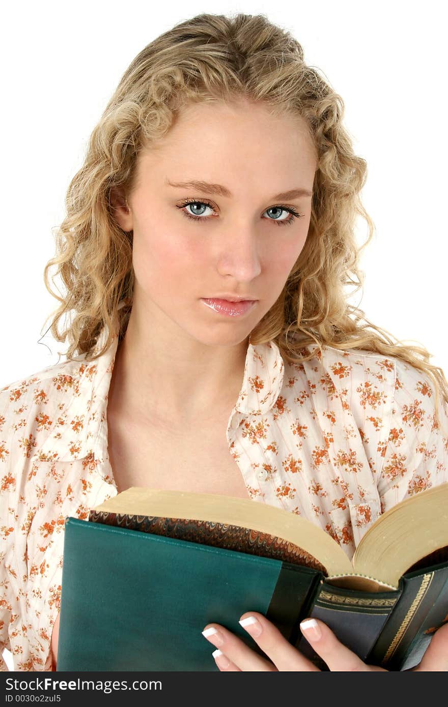 Beautiful woman reading book. Shot in studio over white. Beautiful woman reading book. Shot in studio over white.