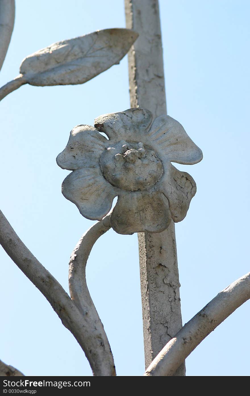 Steel flower against the blue sky