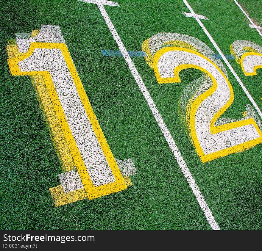 Numbers on a Green running track.