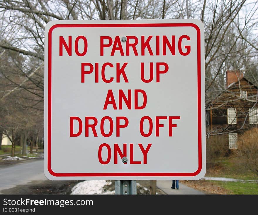 No parking sign in front of school. No parking sign in front of school.