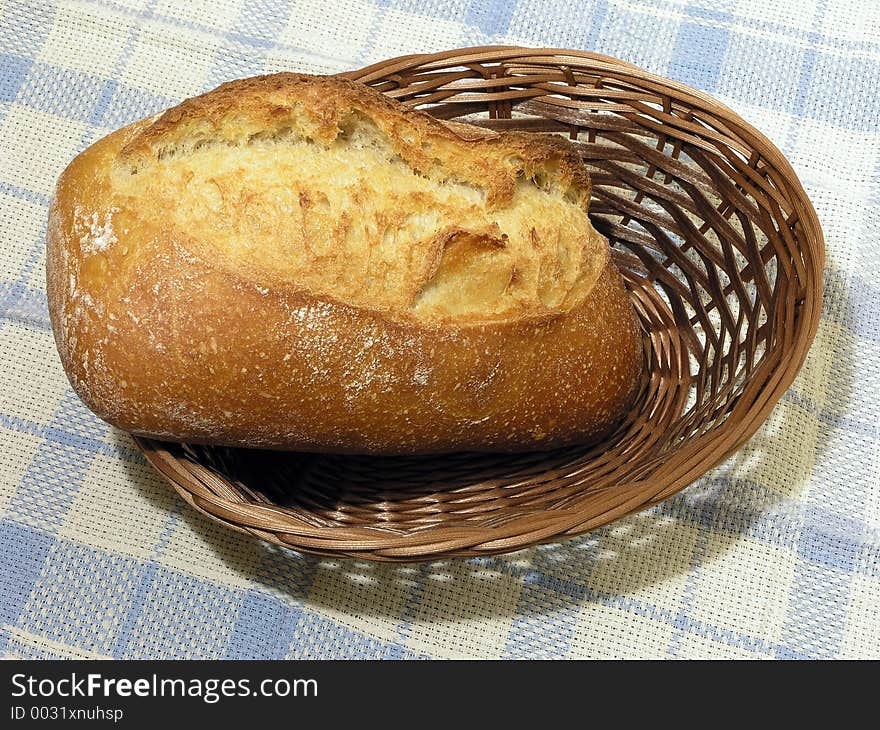 Fancy baked bread in a woven basket. Fancy baked bread in a woven basket