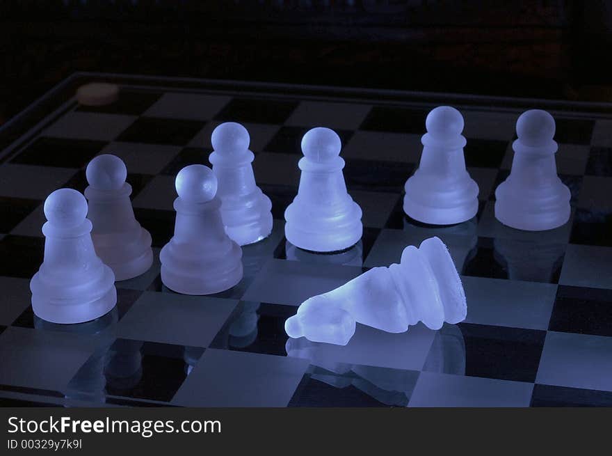 Chessmen at chessboard