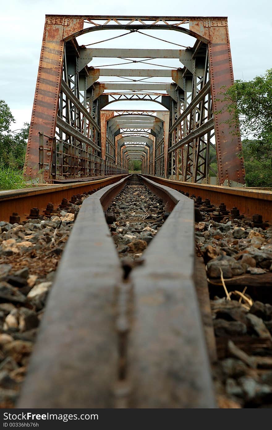 Old rusty train bridge. Old rusty train bridge