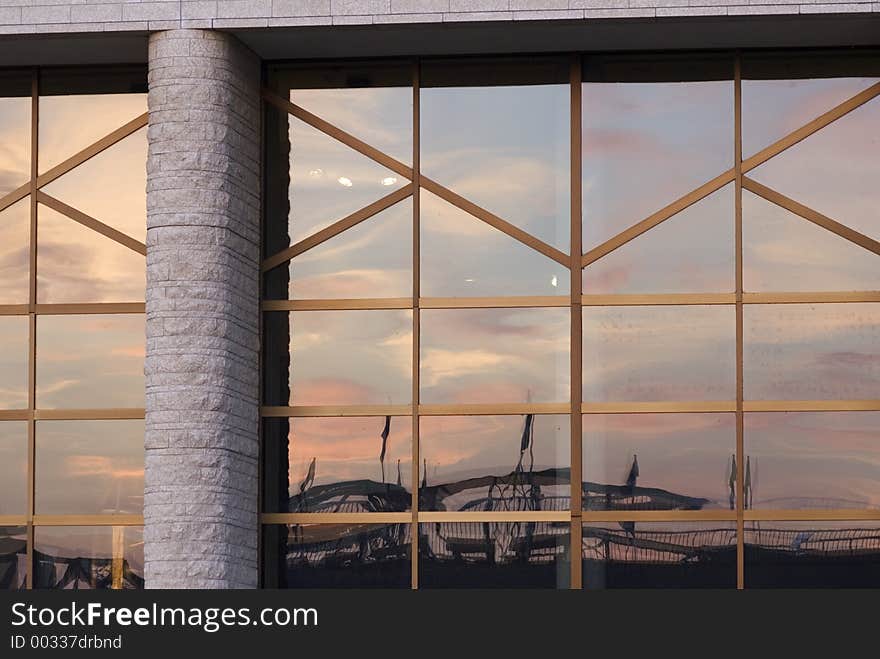 Reflection in a building's windows at Dawn. Reflection in a building's windows at Dawn