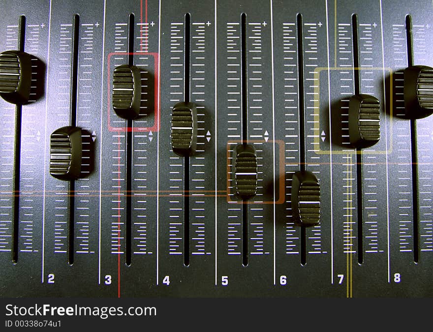 An image of a midi controller with faders with graphic shapes overlayed. An image of a midi controller with faders with graphic shapes overlayed