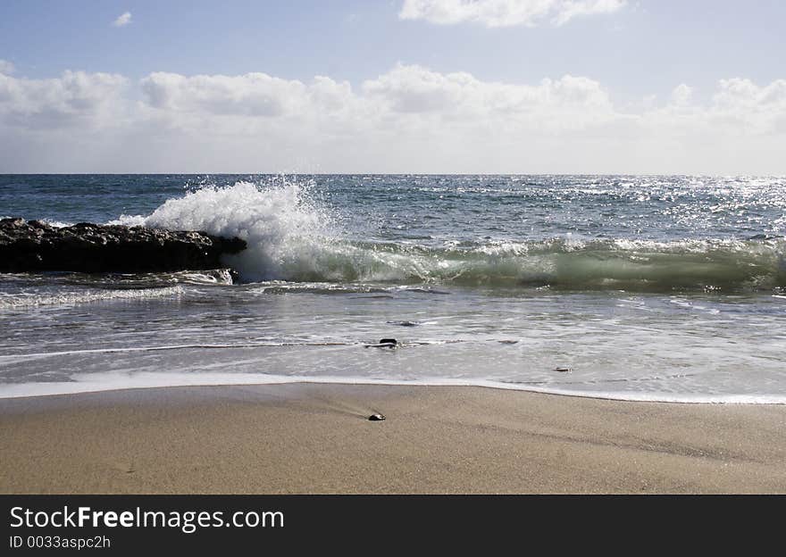 Wave Breaking On Beach